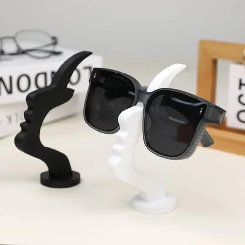 BQSAZHYJ 2Packs Modern Face Shaped Eyeglass Holder Stand Eyewear Display Rack Desktop Storage Organizer for Glasses Sunglasses 3D Printed Artistic Decor (black and white) 3